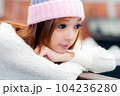 Asian American Woman in beanie cap 104236280
