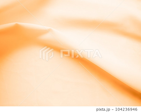 Gold Silk Fabric Background,Texture material Satin Cloth Backdrop,Beige Orange Cream Wave Soft Light Luxury Wallpaper,Linen Pattern Tissue. 104236946