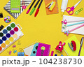 Back to school, education concept. Yellow backpack with school supplies - notebook, pens, ruler, calculator, scissors isolated on yellow background. 104238730