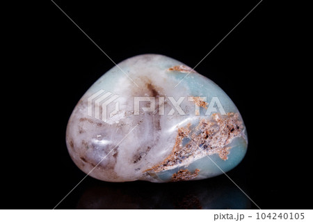Macro Mineral Stone Amazonite on a black background Macro Mineral Stone Amazonite on a black background 104240105