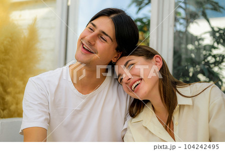 Romantic young people spending vacation time together at home 104242495