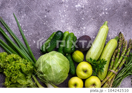 Various green vegetables and fruits 104242510