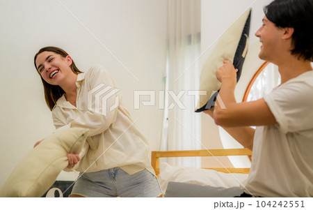 Romantic young people spending vacation time together at home Romantic young people spending vacation time together at home 104242551
