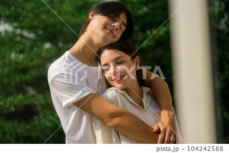 Romantic young people spending vacation time together at home 104242588