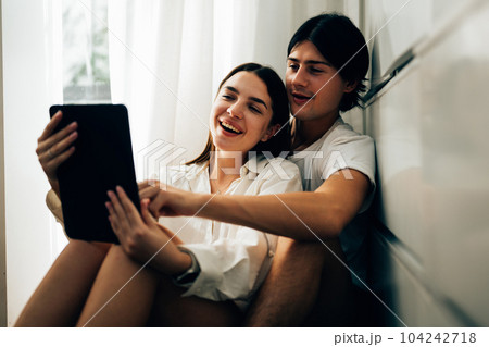 Couple of romantic young people at home, Vintage style photo 104242718