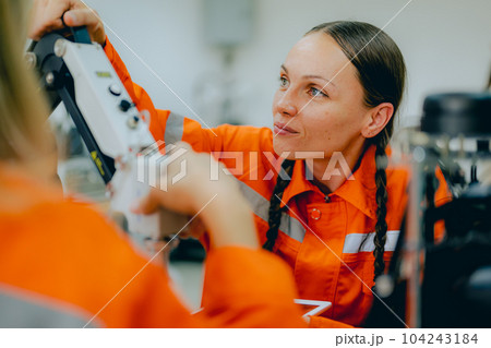 Engineer technician learning and operating in training program 104243184