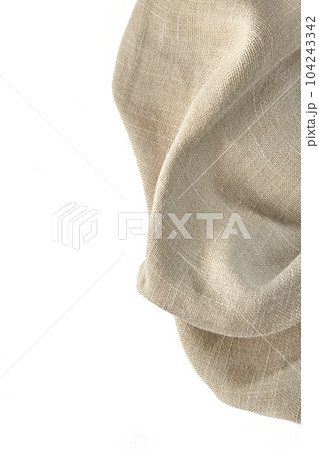 Rough beige linen napkin isolated on white background 104243342