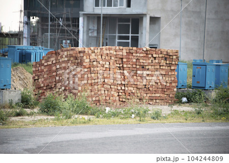 stack of red bricks on the construction site 104244809