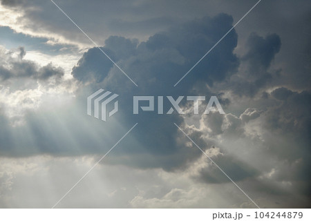 Scattered cloud clusters in a blue sky, blue sky background with white clouds. Scattered cloud clusters in a blue sky, blue sky background with white clouds. 104244879