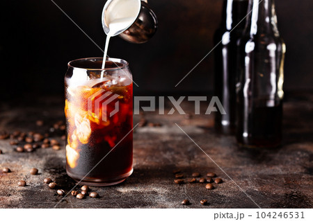 Cold brew iced coffee in glass bottles 104246531