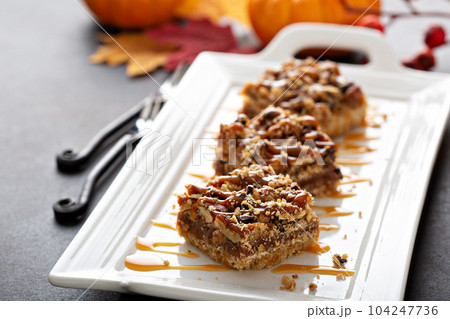 Caramel pecan bars 104247736