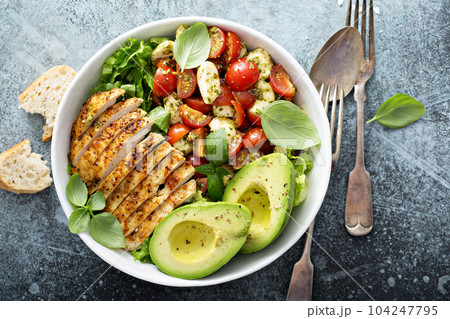 Caprese lunch bowl with grilled chicken 104247795