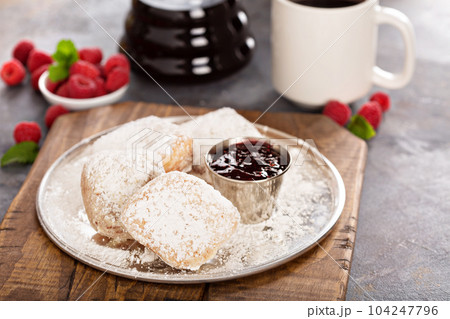 Beignets with raspberry jam 104247796