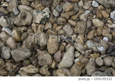 Smooth round pebbles on the beach in Bangkalan, Madura, Indonesia. 104248332