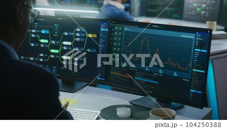 IT software engineers work in monitoring office IT software engineers work in monitoring office 104250388