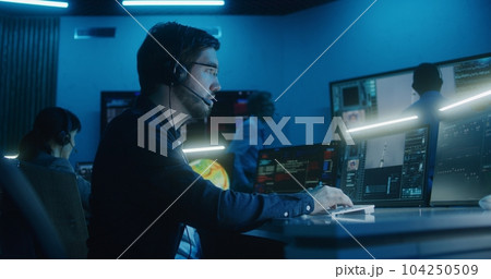 Flight control operator claps hands with group of workers after spacecraft lift off Flight control operator claps hands with group of workers after spacecraft lift off 104250509