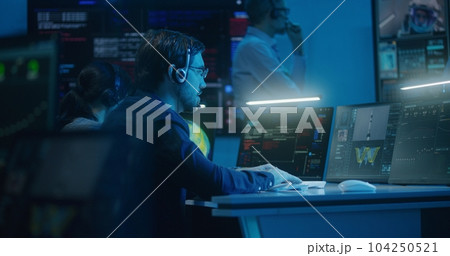 Flight control operators clap hands after space rocket launch Flight control operators clap hands after space rocket launch 104250521