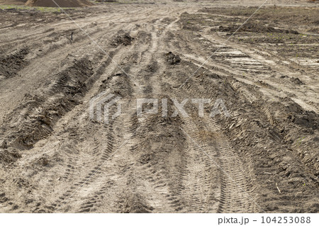 construction of a new walkway in the city park construction of a new walkway in the city park 104253088