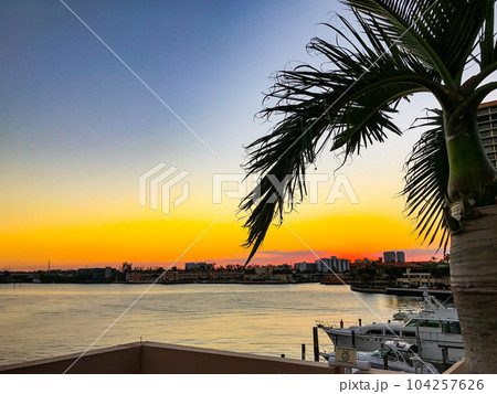 Sunset view of a canal and yachts in Hallandale beach, Florida. High quality photo 104257626