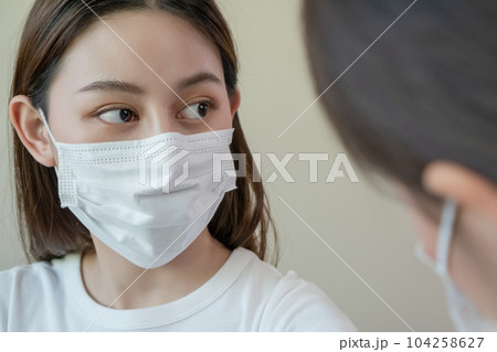 Close up woman wearing mask prevention epidemic of disease. Female flu medicine hygiene. Close up woman wearing mask prevention epidemic of disease. Female flu medicine hygiene. 104258627
