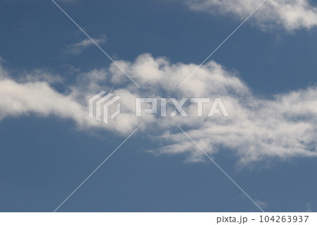 Clear blue sky and white clouds 104263937