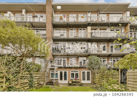 an apartment complex in vancouver, canada with several balks and balks on the second floor there are two balks 104266395