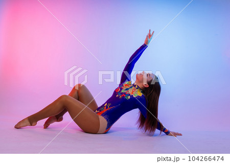 Full length portrait of plump woman doing physical exercise, jumping, white and black background. Full length portrait of plump woman doing physical exercise, jumping, white and black background. 104266474
