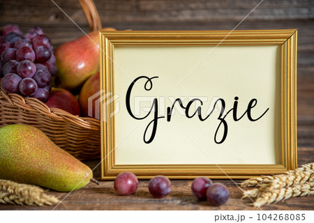 Fall Decoration with Fruits and Text Grazie 104268085