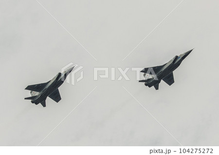 two airplanes mig 31 flying against the sky 104275272