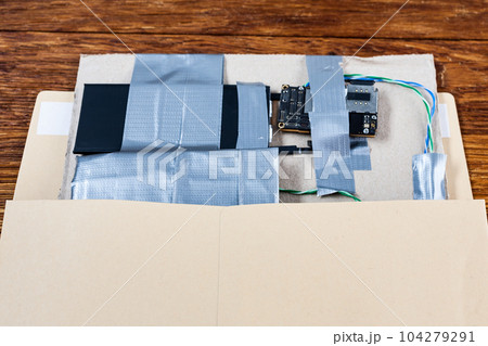 Hand made Improvised Explosive Device with plastic explosive C-4 and cell phone module in envelope 104279291