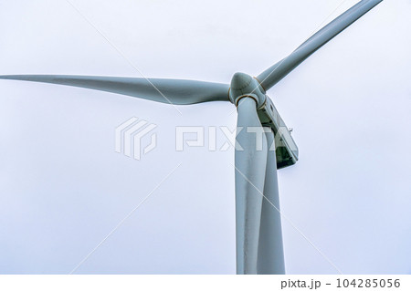 Wind turbine generating electricity clean energy. Clean energy concept. 104285056