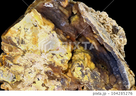 A beautiful specimen of kidney-shaped chalcedony (a kind of quartz mineral) on a black background A beautiful specimen of kidney-shaped chalcedony (a kind of quartz mineral) on a black background 104285276