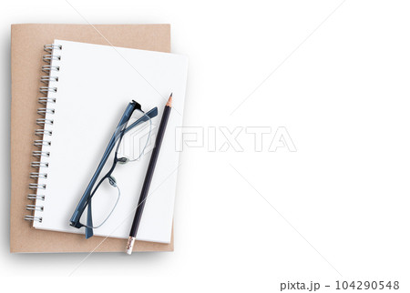 Top view with blank notebook 104290548