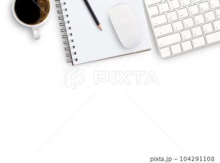 keyboard and coffee on desktop in office keyboard and coffee on desktop in office 104291108