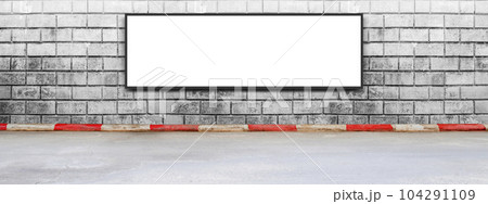 Blank advertising billboard on a brick wall 104291109