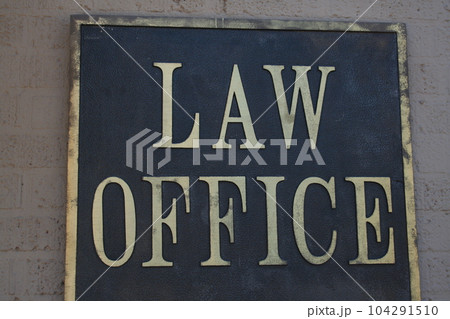 Vintage Law Office Sign on Wall of Downtown Building 104291510