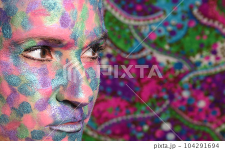 Woman With Colorful Makeup Covering Face. Close up Woman With Colorful Makeup Covering Face. Close up 104291694