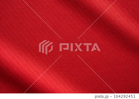 Red sports clothing fabric football jersey texture close up 104292451