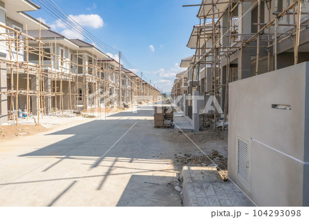 construction residential new house in progress at building site housing estate development 104293098