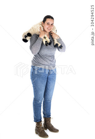 lamb Valais Blacknose and woman farmer lamb Valais Blacknose and woman farmer 104294525