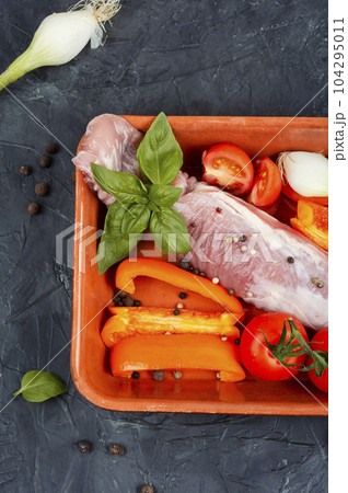 Fresh raw pork tenderloin fillet. 104295011