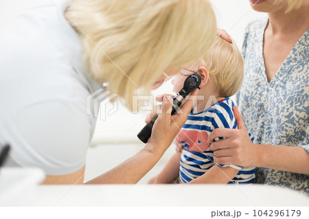 examined child Cartoon child at the doctor being examined. Little kid in ...