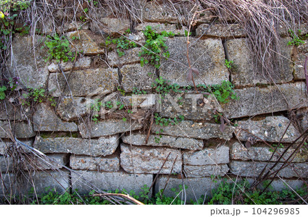 Closeup of rough gray concrete wall background 104296985
