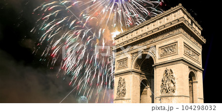 Celebratory colorful fireworks over the Arc de Triomphe, Paris, France 104298032