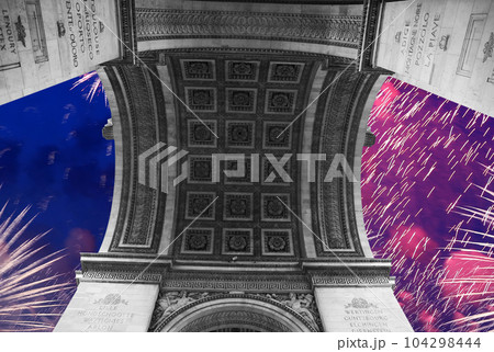 Celebratory colorful fireworks over the Arc de Triomphe, Paris, France 104298444