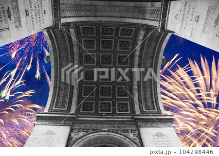 Celebratory colorful fireworks over the Arc de Triomphe, Paris, France 104298446