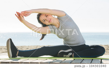 Girl doing yoga 104301040