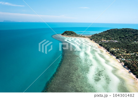 white beach on tropical island white beach on tropical island 104301482