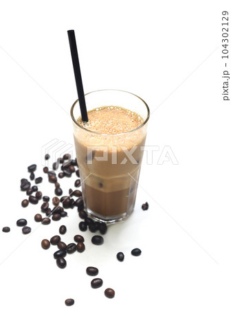 Iced milk espresso with coffee beans on white background closeup Iced milk espresso with coffee beans on white background closeup 104302129