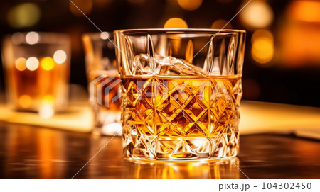 Glasses of whiskey in the background of a bar in a restaurant, alcoholic concept, expensive drink 104302450